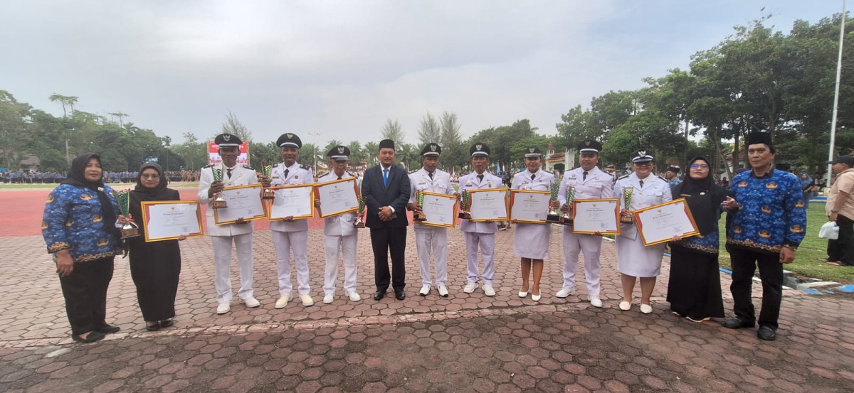 Poto Bersama  Pemenang Desa Terbaik Kabupaten Deli Serdang Bersama Kadis PMD Bapak Dr. Drs. Citra Effendi Capah, MSP