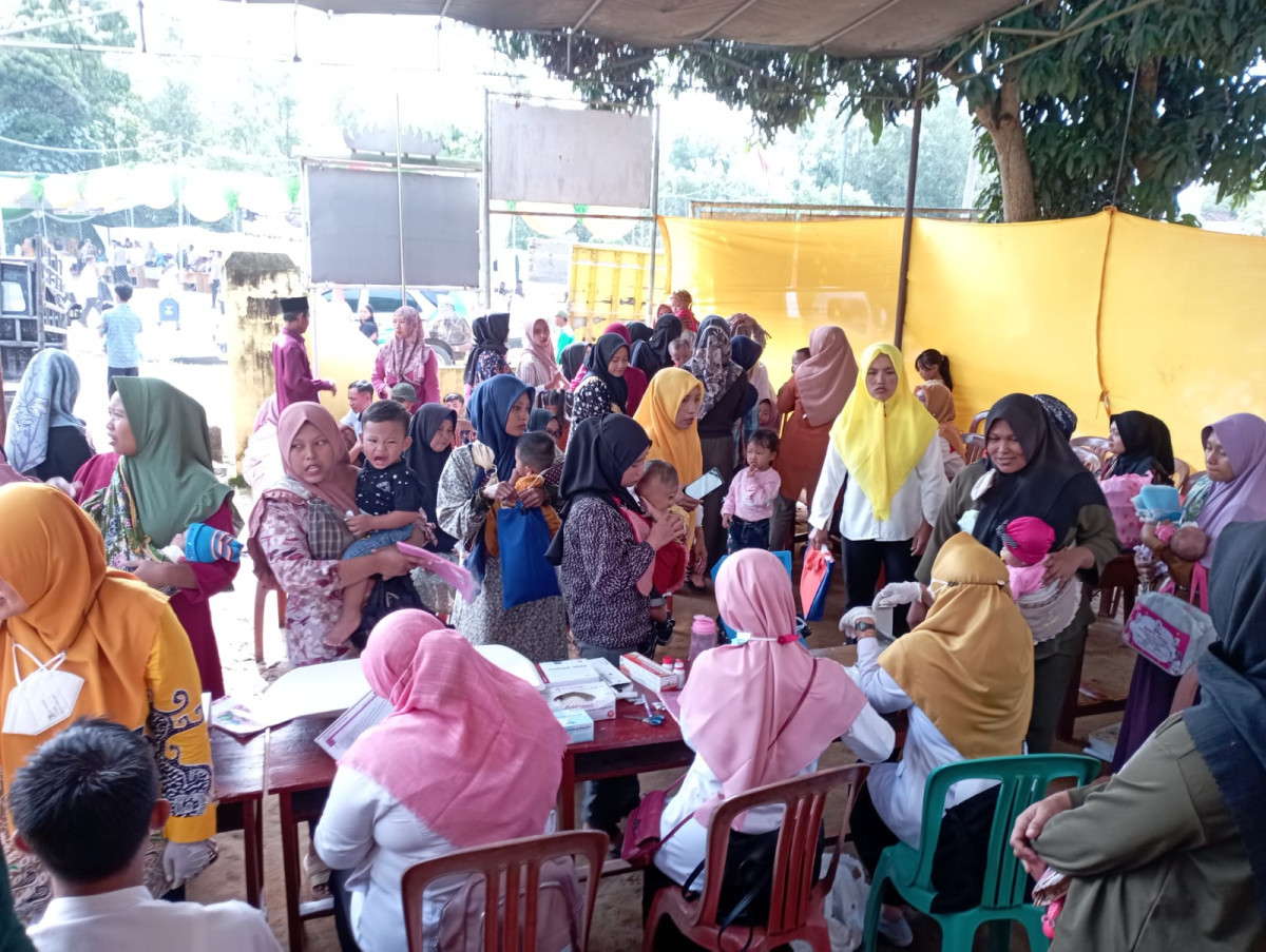 Kegiatan Pelayanan KB dalam rangka kegiatan Bunga Kampung Mekar di Dusun yang menjadi Program Bapak Bupati Kabupaten Lampung Tengah