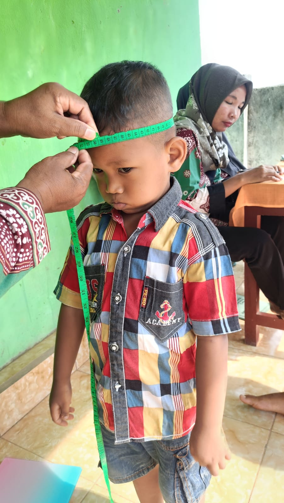 Pengukuran lingkar kepala