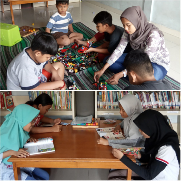  adik-adik bermain lego dan membaca buku cerita 