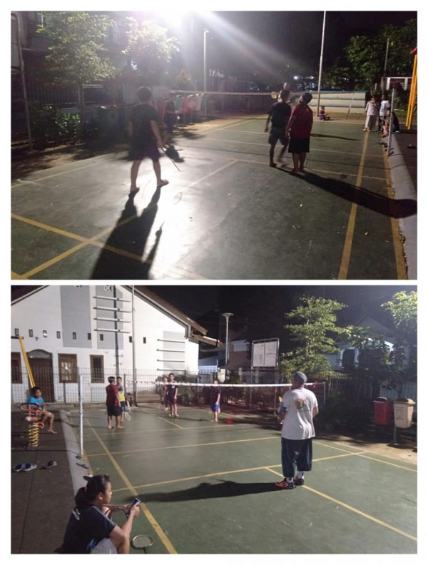 giat bermain badminton warga