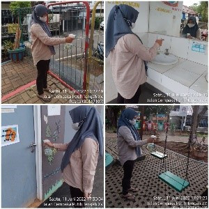 Giat penyemprotan cairan disinfektan di area RPTRA Kampung Benda