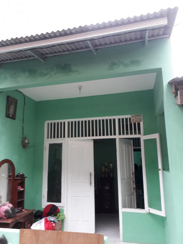 Rumah yang sudah selesai di bedah