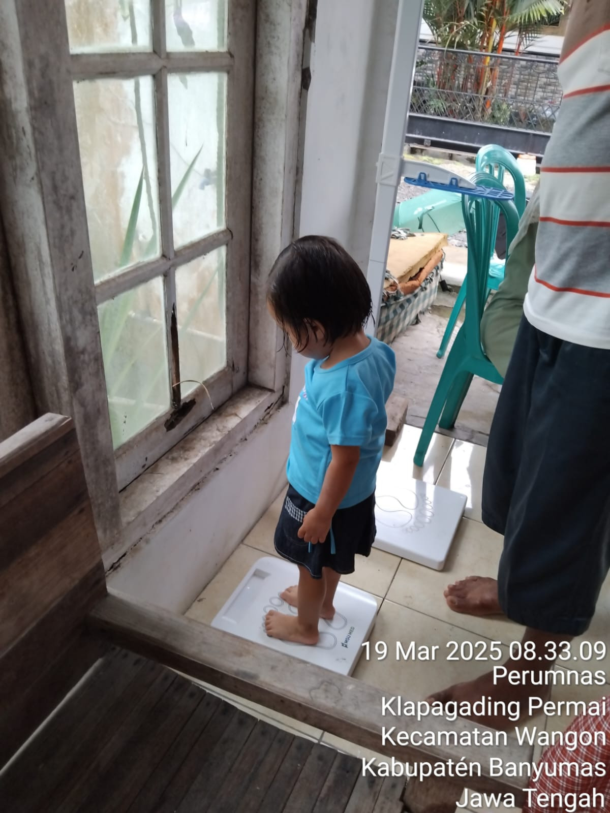 Pengukuran berat badan balita