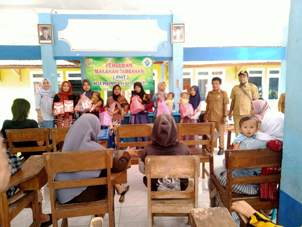 Pemberian PMT Bumil Kek dan Balita