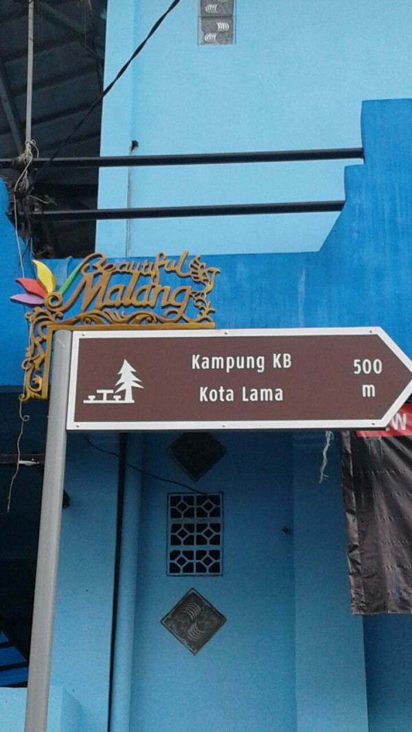 Papan nama pennunjuk arah Kampung KB