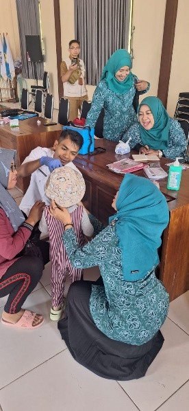 Melaksanakan kegiatan pin polio