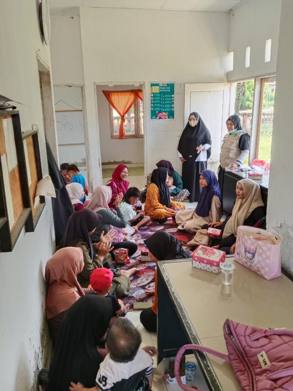 Melaksanakan Posyandu Aktif