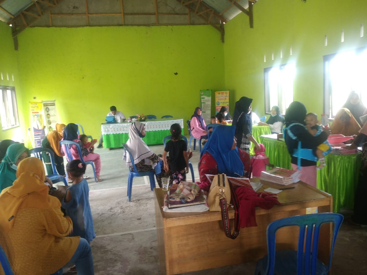 Suasana kegiatan pelayanan rutin Posyandu Desa Ilodulunga