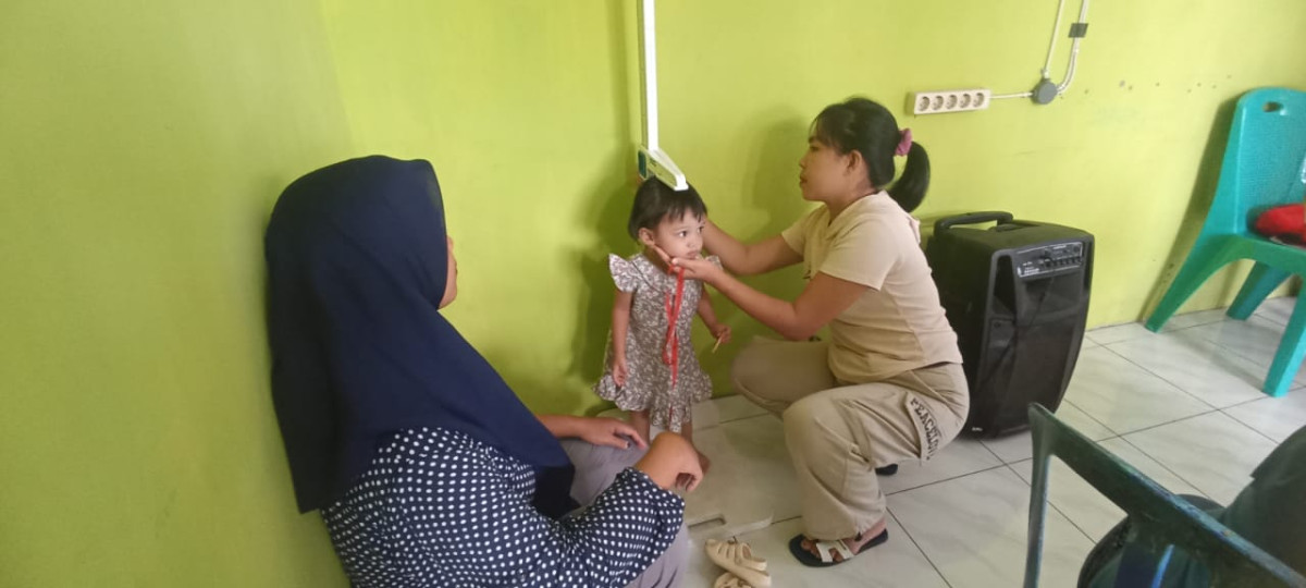 pengukuran tinggi badan anak