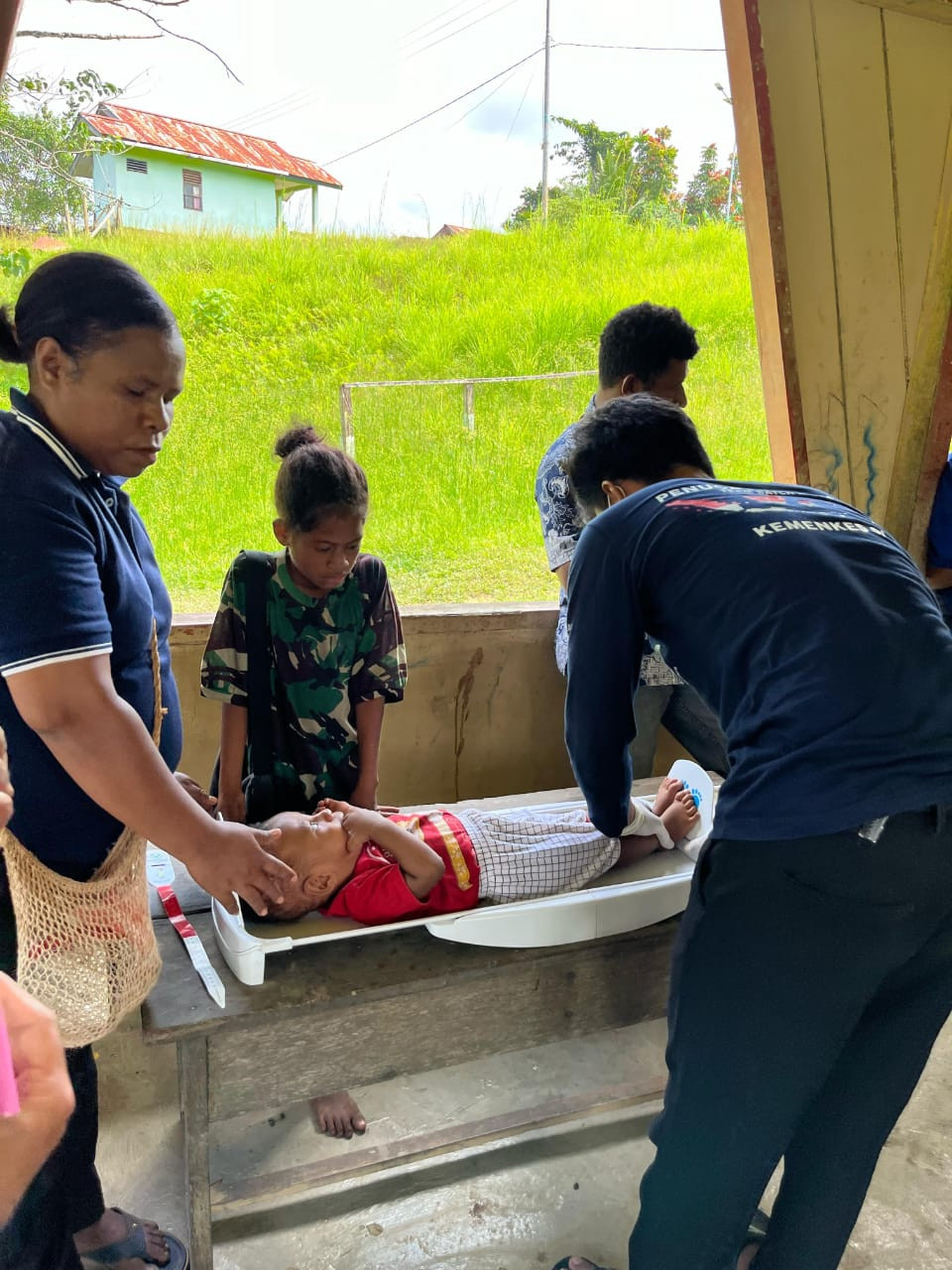 PENIMBANGAN BERAT BADAN PENGUKURAN TINGGI BADAN  BALITA DI KAMPUNG YARMATUM